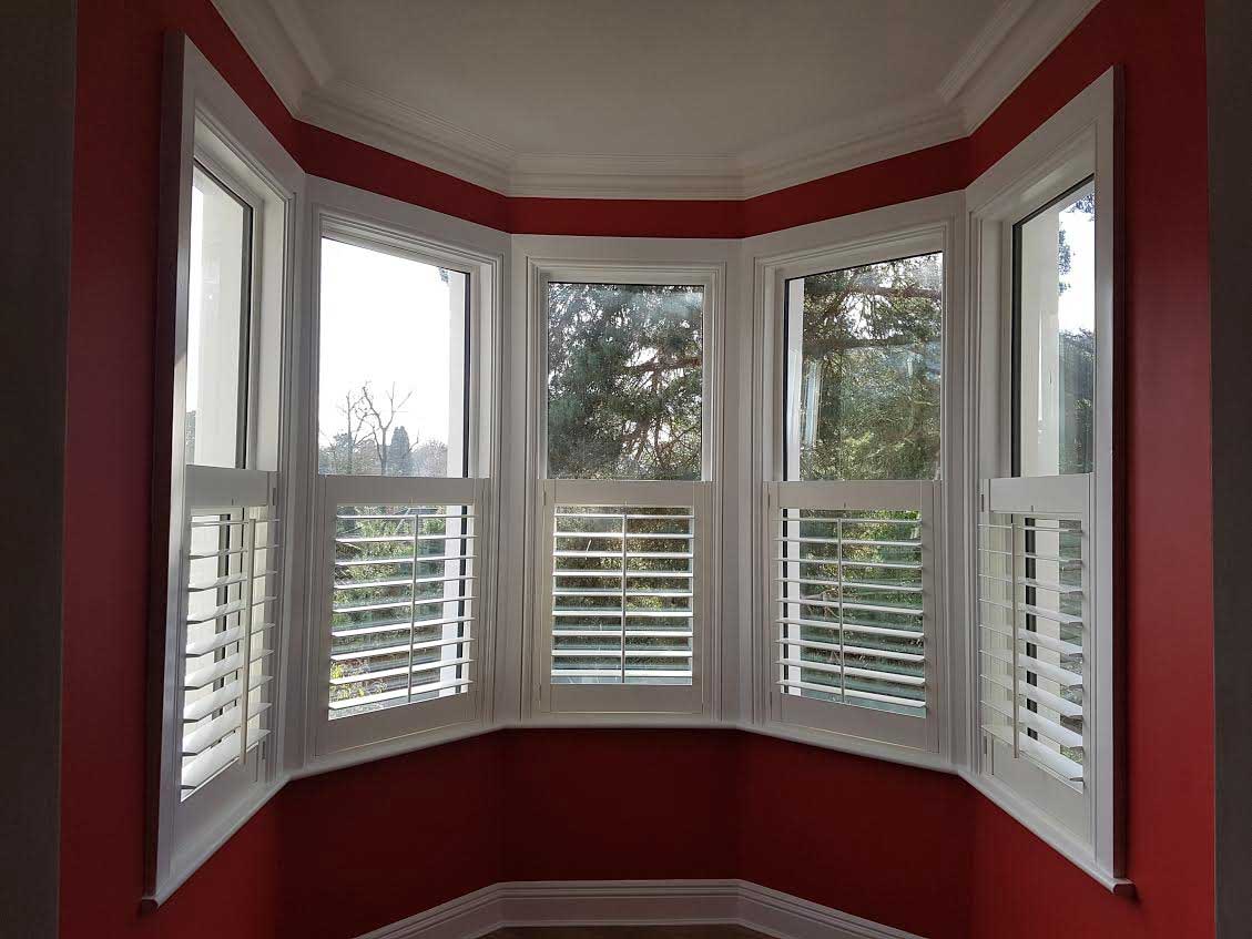 white-shutters-in-turret-window