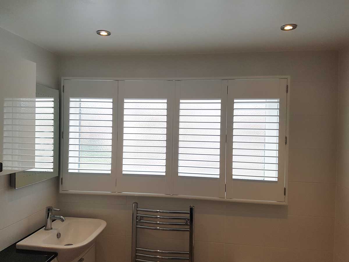 Window-shutters-tilt-and-turn-windows-in-bathroom