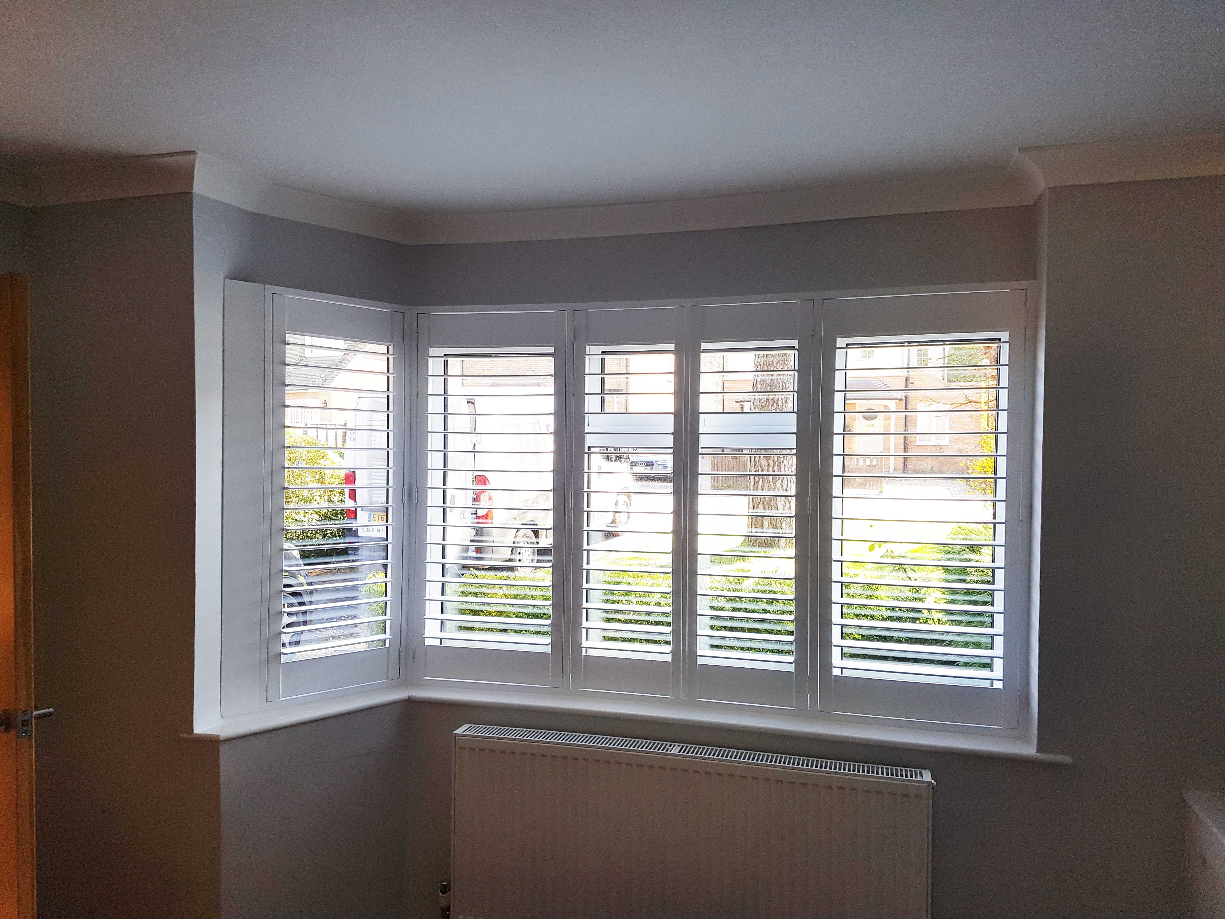 l-shape-bay-window-with-shutters